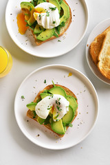 Healthy open sandwich with poached eggs