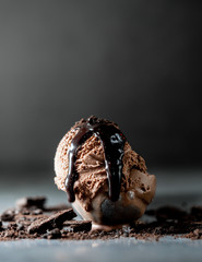 One scoop of Chocolate Ice cream on table with chiaroscuro picture style with copy space for add text.