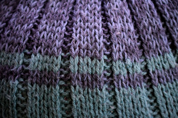 knitted fabric handmade purple-turquoise with a strip of fragment