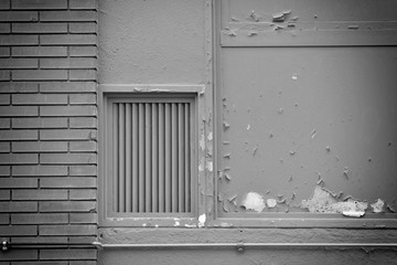 building facade with ventilation closed grate hole