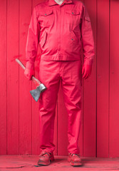 man in red clothes with an ax