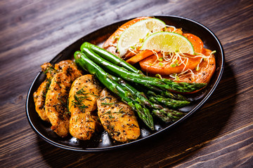 Grilled chicken strips and vegetables