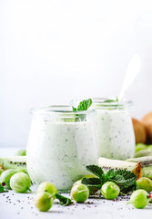 Gooseberry Kiwi Smoothie or Milkshake with Chia Seeds, Gray Table, Place for Text
