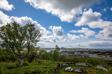 White clouds on mountains and landscape - Torghatten in Northern Norway
