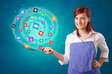 Young happy person cooking applications in wok
