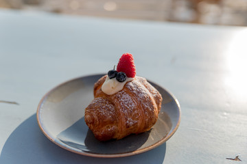 Croissants with berries and cream