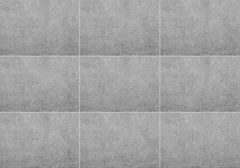 tiled wall background , grey stone / concrete texture  -