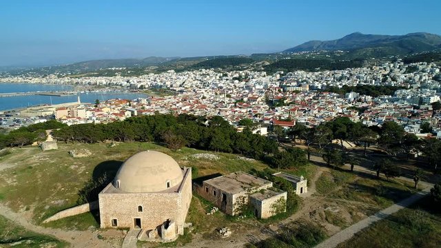 Medieval fortress and the city on the background of the sea.