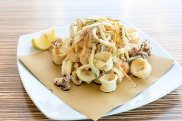 Fried mixed fish with lemon