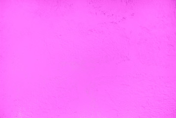 Textured relief plastered painted wall pink color