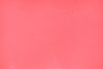 Textured relief plastered painted wall peach color