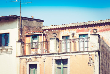 Fototapeta premium Facade wall of old baroque building in Taormina, traditional architecture of Sicily, Italy.