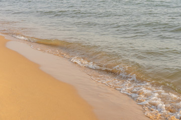 Fototapeta na wymiar Peaceful beach with some small waves background