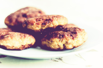 homemade fried minced meat cutlets on white plate, traditional Ukrainian dish .