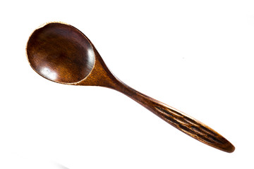 Wooden spoon on white background