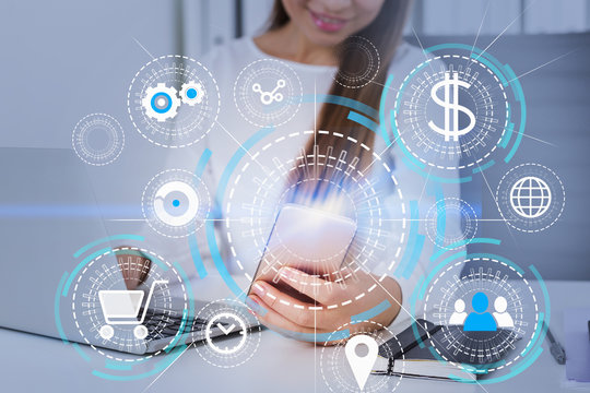 Smiling woman with phone buying online