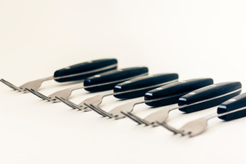 Close up six forks isolated on white background.