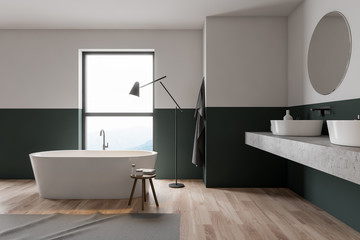 Obraz na płótnie Canvas Green and white bathroom interior
