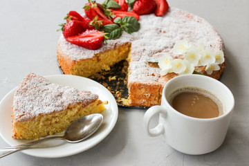 Orange cake decorated with strawberries