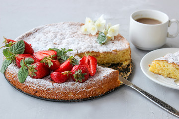 Orange cake decorated with strawberries