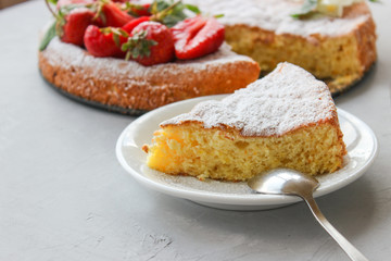 Orange cake decorated with strawberries