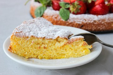 Orange cake decorated with strawberries