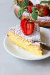 Orange cake decorated with strawberries