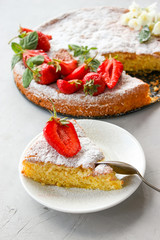 Orange cake decorated with strawberries