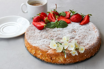 Orange cake decorated with strawberries