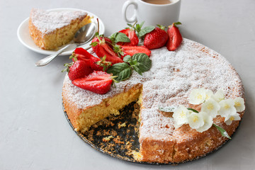 Orange cake decorated with strawberries