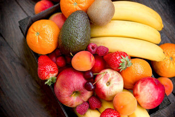 Organic fruits in create close-up, fresh organic food