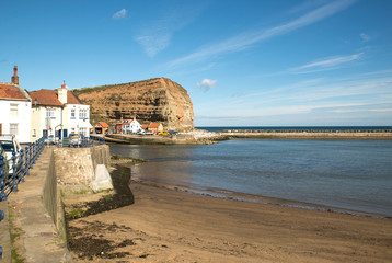 Cliff and harbour at Staithes, East Yorkshire, UK