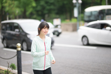 Fototapeta premium ランニング・女性・市街地