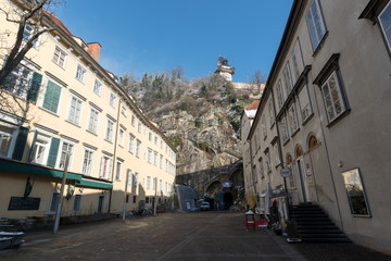 Fototapeta na wymiar The clock tower of schlossberg hill of Graz, Austria.