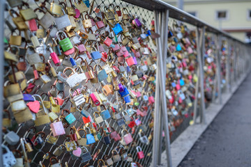 Fototapeta premium Decorative locks in a bridge of Graz, Austria.