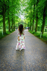 woman wearing dress outdoors in Cambridge park.