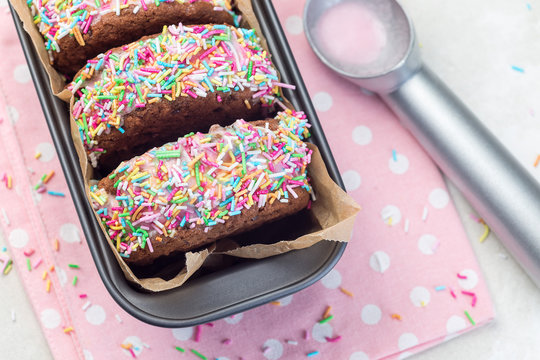 Homemade Ice Cream Sandwich With Chocolate Chip Cookie, Watermelon Ice Cream,  Covered With Colorful Sprinkles, Horizontal, Top View