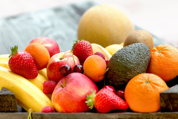 Fresh fruit, organic fruits close-up on rustic table