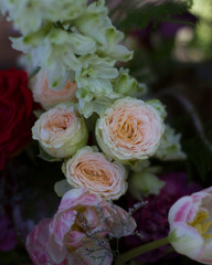 bouquet of different flowers and pink roses