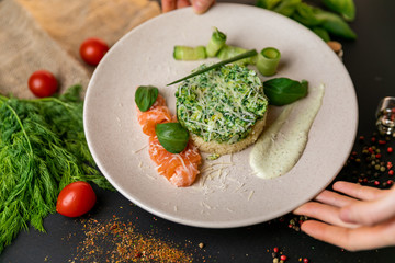 eggs benedict breakfast bacon poached egg, potato and salad . Healthy food, top view. Black background . Slow-mo.