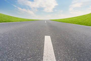 empty asphalt road and blue sky