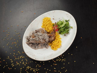 Chicken legs roasted with the mushrooms and lentils