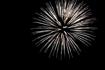 golden yellow fireworks on an isolated black background for design decoration of holidays, the new...