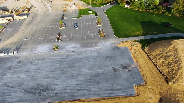Aerial pan over patterns of heavy equipment tracks in the dirt, Lancaster Evangelical Free Church, Lititz Pennsylvania