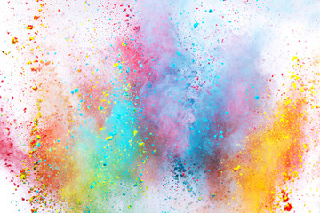 Colored powder explosion on white background. Freeze motion.