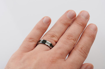 Black ring on man finger