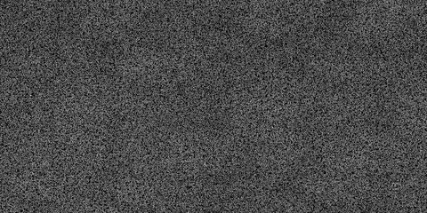 Concrete wall decoration texture, background. The pavement of granite stone. any paved area or surface. Old cobblestone road pavement texture, grass between stones