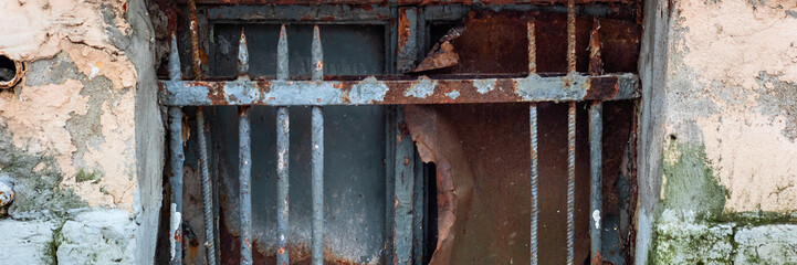 Boarded doorway with grill