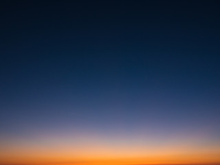 Beautiful gradient sky at dusk, from dark blue to orange