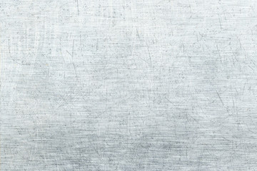 Brushed light metal texture.